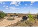 Spacious backyard patio with fire pit and seating area at 8551 Orchard Way, Arvada, CO 80007