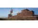 Sky Ranch community entrance with brick wall and signage at 700 N Bently St, Watkins, CO 80137