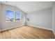 Large bedroom with hardwood floors and vaulted ceilings at 779 Kohlor Dr, Lafayette, CO 80026