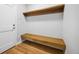 Modern entryway with built-in bench and coat hooks at 779 Kohlor Dr, Lafayette, CO 80026