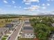 Aerial view of a street lined with new houses, showcasing a suburban landscape at 779 Kohlor Dr, Lafayette, CO 80026