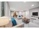 Finished basement with a sitting area and entertainment space at 779 Kohlor Dr, Lafayette, CO 80026