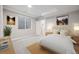 Comfortable basement bedroom with neutral decor and large windows at 779 Kohlor Dr, Lafayette, CO 80026