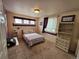 Cozy bedroom with double bed and built-in shelving at 20175 Edinborough Pl, Parker, CO 80138