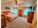 Spacious Primary bedroom with carpeted floors and large windows at 20175 Edinborough Pl, Parker, CO 80138
