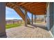 Covered patio with stairs, mountain views at 18456 W 83Rd Dr, Arvada, CO 80007