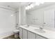 Clean bathroom with double vanity, mirror and bathtub at 39243 Clymer St, Elizabeth, CO 80107