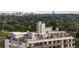 Aerial view of a building with a rooftop deck and city views at 669 N Washington St # 901, Denver, CO 80203