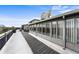Long rooftop deck with city views and wooden deck at 669 N Washington St # 901, Denver, CO 80203