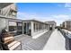 Rooftop deck with seating area and access to interior rooms at 669 N Washington St # 901, Denver, CO 80203
