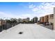Large rooftop deck space with city views and lounge chairs at 669 N Washington St # 901, Denver, CO 80203