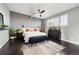 Spacious bedroom with a ceiling fan, large windows, and plenty of natural light at 669 N Washington St # 901, Denver, CO 80203