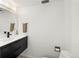 Clean bathroom with a floating vanity and modern fixtures at 669 N Washington St # 901, Denver, CO 80203