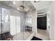 Spa-like shower with glass enclosure and dual shower heads at 669 N Washington St # 901, Denver, CO 80203