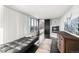 Long hallway with a built-in fireplace and access to the bedroom at 669 N Washington St # 901, Denver, CO 80203