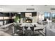 Living area features a modern fireplace and kitchen access at 669 N Washington St # 901, Denver, CO 80203