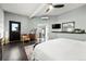 Main bedroom with private access, ceiling fan and stylish decor at 669 N Washington St # 901, Denver, CO 80203