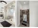 Bathroom with glass shower and a urinal at 669 N Washington St # 901, Denver, CO 80203