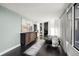Hallway with large artwork, access to bedroom and bathroom at 669 N Washington St # 901, Denver, CO 80203