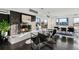 Living area with a modern fireplace and city views at 669 N Washington St # 901, Denver, CO 80203