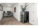 Home office with a desk, chair, and mini-fridge at 669 N Washington St # 901, Denver, CO 80203