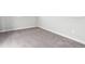 Empty bedroom with carpeting and white baseboards at 1737 Marlowe E Cir, Erie, CO 80516