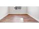 Empty bedroom with wood-style flooring and ample natural light at 1737 Marlowe E Cir, Erie, CO 80516