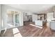 Open concept kitchen and dining area with sliding glass doors to the patio at 1737 Marlowe E Cir, Erie, CO 80516