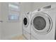 Laundry room with washer and dryer at 9045 E 58Th Dr, Denver, CO 80238