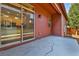 Concrete patio with sliding glass door to kitchen at 9045 E 58Th Dr, Denver, CO 80238