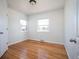 Spacious bedroom with hardwood floors and large windows at 1283 Trenton St, Denver, CO 80220