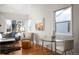 Dining area with glass table and chairs, adjacent to living room at 1283 Trenton St, Denver, CO 80220