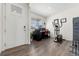 Home office with hardwood floors and plenty of natural light at 45827 Red Tail Dr, Bennett, CO 80102