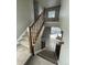 View of the main level living area from the upstairs at 183 Mt Bierstadt St, Brighton, CO 80601