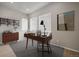 Modern home office with wood desk, shelving, and area rug at 1739 W 166Th Ave, Broomfield, CO 80023