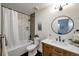 Stylish bathroom with modern vanity and bathtub at 1417 Monroe St, Denver, CO 80206