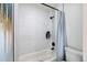 Clean bathroom with a bathtub and shower at 1417 Monroe St, Denver, CO 80206