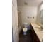 Clean bathroom with a single sink vanity, shower/tub combo, and toilet at 467 S Memphis Way # 17, Aurora, CO 80017