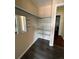 Well-organized closet with ample shelving and mirror at 467 S Memphis Way # 17, Aurora, CO 80017