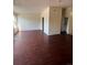 Spacious living area with dark hardwood floors and ample natural light at 467 S Memphis Way # 17, Aurora, CO 80017