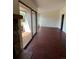 Living room with hardwood floors and access to a private balcony at 467 S Memphis Way # 17, Aurora, CO 80017
