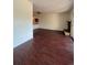 Spacious living room featuring hardwood floors and a fireplace at 467 S Memphis Way # 17, Aurora, CO 80017