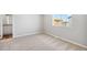 Spacious bedroom with carpet flooring and a window at 7238 Arkansas St, Frederick, CO 80530