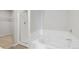 Bathroom with soaking tub and walk-in shower at 7238 Arkansas St, Frederick, CO 80530