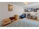 Finished basement with a sitting area and extra storage at 4009 Wonderland Hill Ave, Boulder, CO 80304