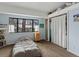 Spacious bedroom with large window and built-in shelves at 4009 Wonderland Hill Ave, Boulder, CO 80304