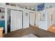 Bedroom with a large mirrored closet and additional storage at 4009 Wonderland Hill Ave, Boulder, CO 80304