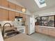 Well-equipped kitchen with light wood cabinets and ample counter space at 4009 Wonderland Hill Ave, Boulder, CO 80304