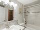 Elegant bathroom with marble tile and soaking tub at 4009 Wonderland Hill Ave, Boulder, CO 80304