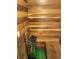 Sauna with wood walls, bench, and a metal heater at 4009 Wonderland Hill Ave, Boulder, CO 80304